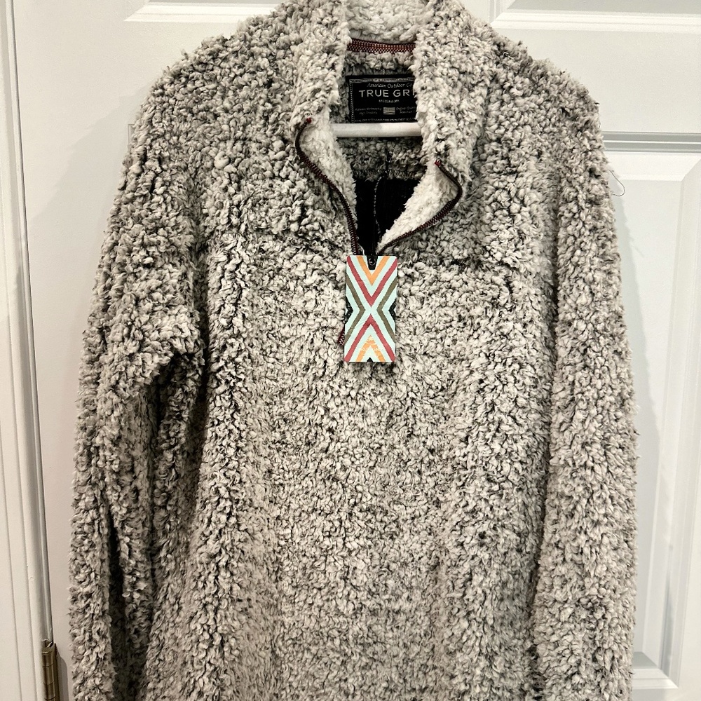5 different True Grit 1/4 zip pullovers
